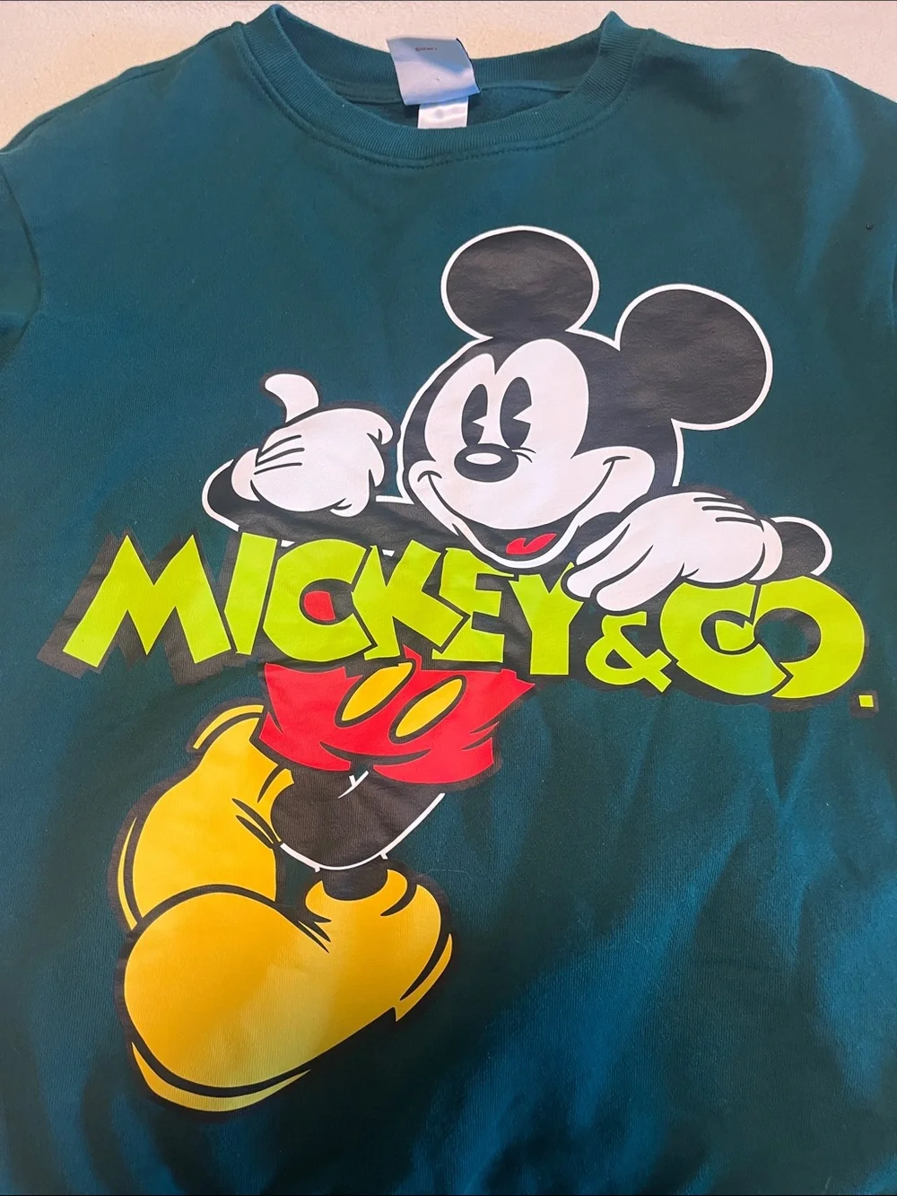 Disney Teal Mickey Mouse Graphic Sweatshirt with Yellow and Red Accents